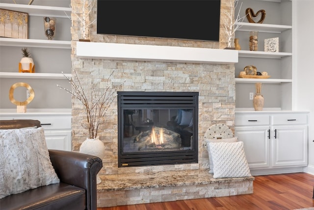 2545 Silver Oak Trl, Marion, IA 52302 - detailed view of wood finished floors, a fireplace, and built in features