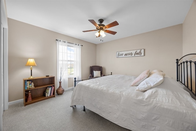 2545 Silver Oak Trl, Marion, IA 52302 - bedroom featuring carpet floors, baseboards, and ceiling fan