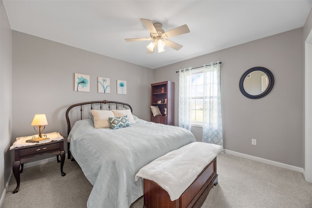 2545 Silver Oak Trl, Marion, IA 52302 - bedroom with light colored carpet, baseboards, and ceiling fan