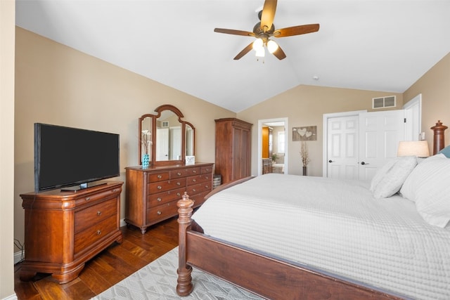 2545 Silver Oak Trl, Marion, IA 52302 - bedroom with dark wood-type flooring, vaulted ceiling, a ceiling fan, and a closet