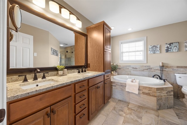 2545 Silver Oak Trl, Marion, IA 52302 - bathroom with toilet, a garden tub, double vanity, and tiled shower