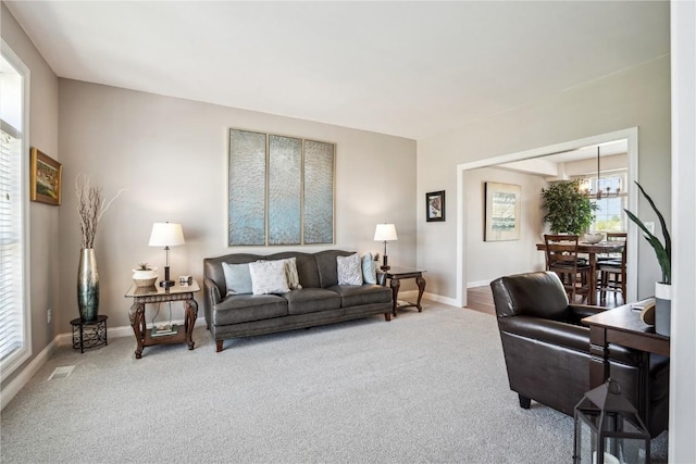 2545 Silver Oak Trl, Marion, IA 52302 - carpeted home office with baseboards and a chandelier