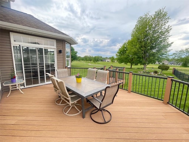 2545 Silver Oak Trl, Marion, IA 52302 - wooden deck featuring outdoor dining area and a yard
