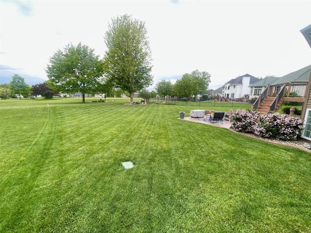 2545 Silver Oak Trl, Marion, IA 52302 - view of yard featuring a patio, stairway, and a deck