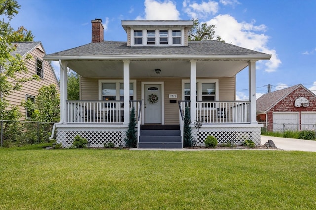 2715 Dalewood Ave SE, Cedar Rapids, IA 52403 - bungalow-style house with covered porch, a chimney, and roof with shingles