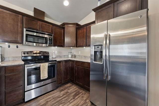 1330 Redbud Ave, Tiffin, IA 52340 - kitchen with appliances with stainless steel finishes, dark brown cabinetry, dark wood-type flooring, light countertops, and recessed lighting