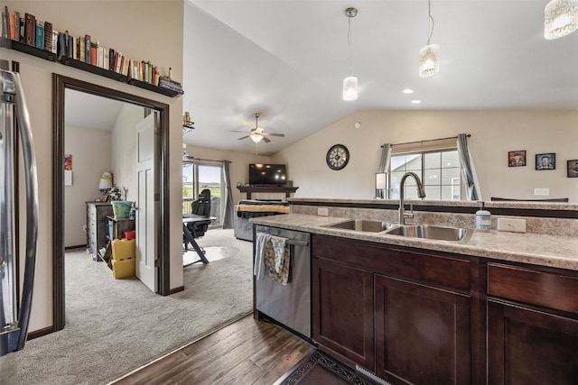 1330 Redbud Ave, Tiffin, IA 52340 - kitchen featuring dishwasher, a sink, wood finished floors, lofted ceiling, and dark brown cabinets