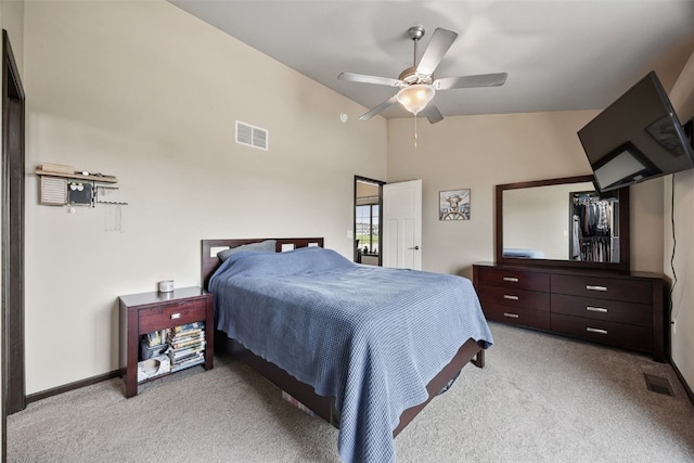 1330 Redbud Ave, Tiffin, IA 52340 - bedroom featuring light colored carpet, ceiling fan, vaulted ceiling, and baseboards