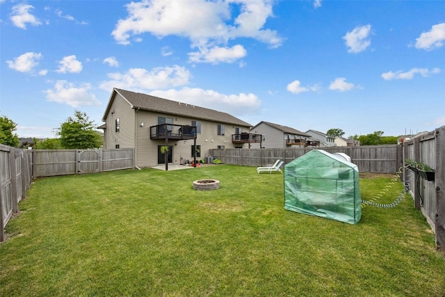 1330 Redbud Ave, Tiffin, IA 52340 - view of yard featuring an outdoor fire pit