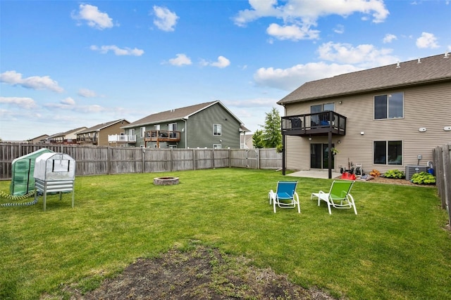 1330 Redbud Ave, Tiffin, IA 52340 - view of yard featuring a fire pit and cooling unit
