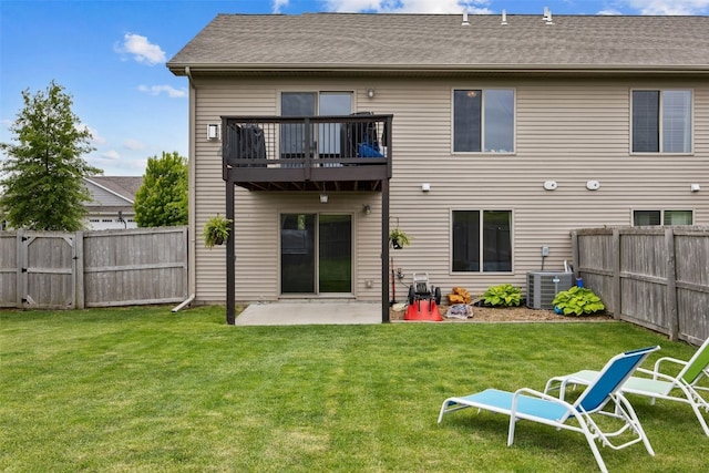 1330 Redbud Ave, Tiffin, IA 52340 - rear view of house featuring a balcony, central AC, a patio area, and a gate