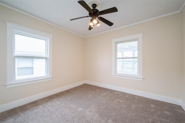 662 19th Ave SW, Cedar Rapids, IA 52404 - empty room featuring carpet, baseboards, crown molding, and ceiling fan