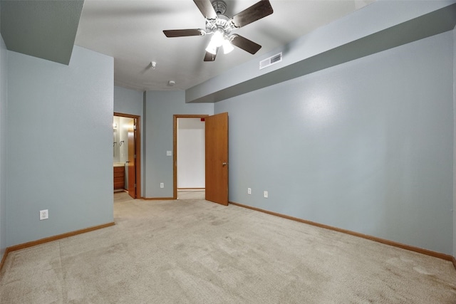 364 Camden Rd, Iowa City, IA 52245 - unfurnished bedroom with carpet floors, baseboards, and connected bathroom