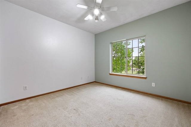 364 Camden Rd, Iowa City, IA 52245 - unfurnished room featuring carpet, baseboards, and a ceiling fan
