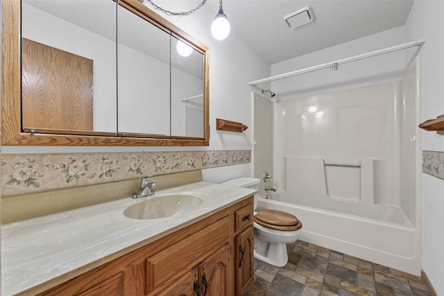 1042 Arthur Dr NW, Cedar Rapids, IA 52405 - bathroom with vanity, shower / bathtub combination, and stone finish floors