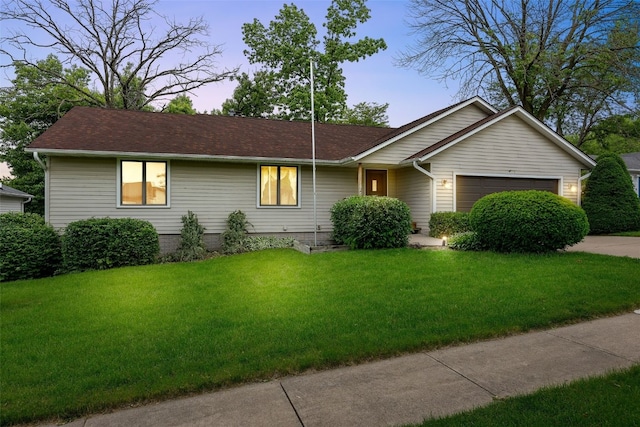 1042 Arthur Dr NW, Cedar Rapids, IA 52405 - ranch-style house featuring a garage, a front lawn, concrete driveway, and a shingled roof