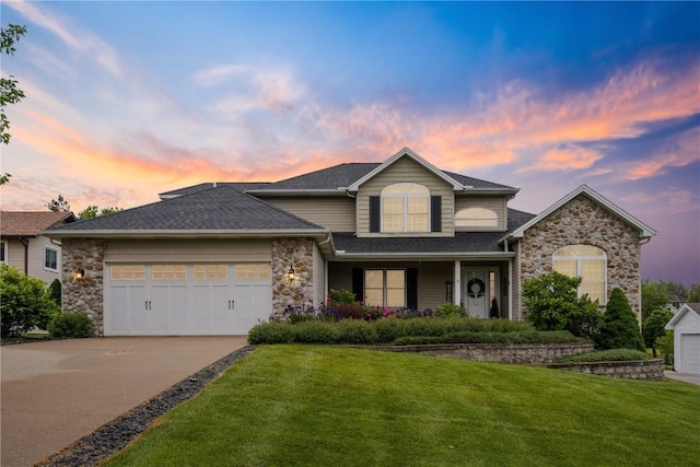 4000 Majestic Ct NE, Cedar Rapids, IA 52411 - traditional-style home with stone siding, a garage, a front lawn, concrete driveway, and roof with shingles