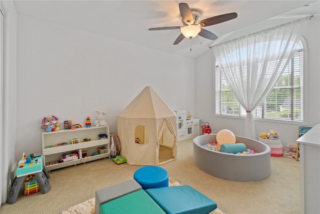 4000 Majestic Ct NE, Cedar Rapids, IA 52411 - game room featuring carpet floors, a ceiling fan, and lofted ceiling