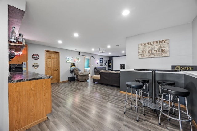 8001 Turtlerun Dr NE, Cedar Rapids, IA 52402 - bar area with recessed lighting and wood finished floors