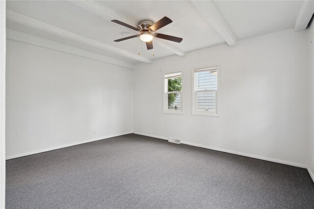 654 34th St SE, Cedar Rapids, IA 52403 - carpeted spare room with beamed ceiling, ceiling fan, and baseboards