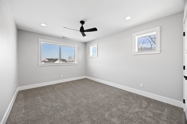 1504 Legend Dr, Tiffin, IA 52340 - spare room featuring ceiling fan, carpet, baseboards, and recessed lighting
