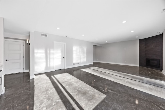 1504 Legend Dr, Tiffin, IA 52340 - unfurnished living room with a fireplace, recessed lighting, and baseboards