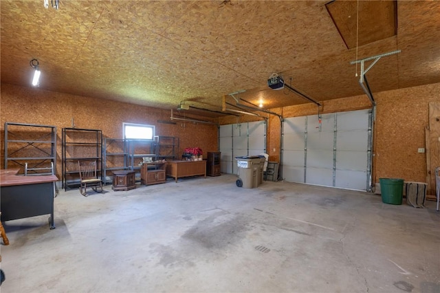 409 Oak St, Rowley, IA 52329 - garage with a garage door opener