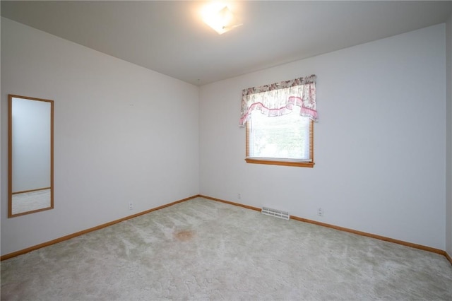 409 Oak St, Rowley, IA 52329 - empty room featuring carpet floors and baseboards