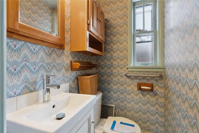 2325 Grande Ave SE, Cedar Rapids, IA 52403 - bathroom with vanity and toilet