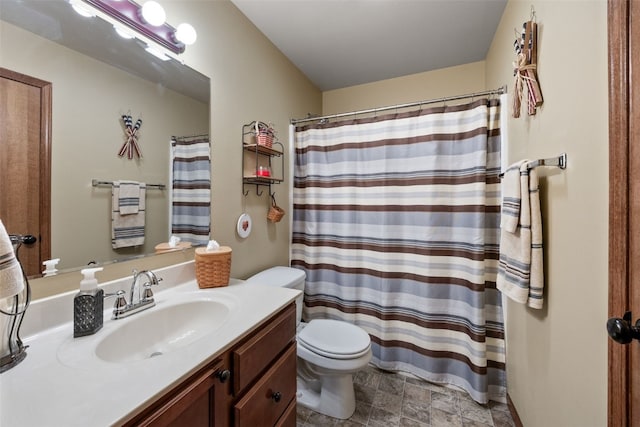 302 Duchess Dr, Solon, IA 52333 - bathroom featuring toilet, vanity, stone finish floors, and curtained shower