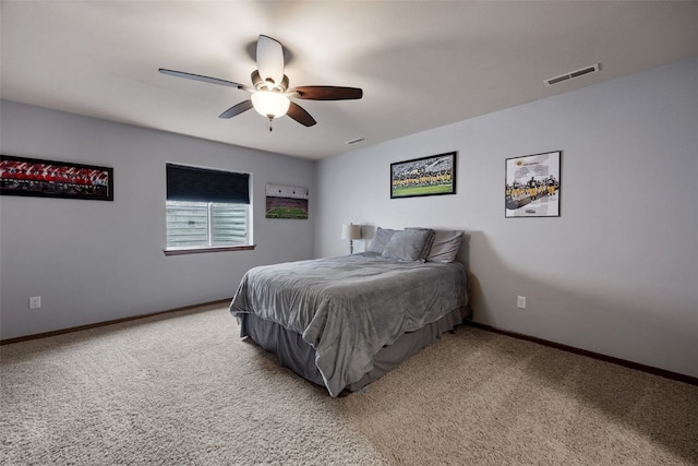 302 Duchess Dr, Solon, IA 52333 - bedroom with carpet, baseboards, and ceiling fan