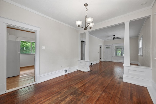 414 18th St, Cedar Rapids, IA 52403 - unfurnished room featuring ornamental molding, a ceiling fan, ornate columns, hardwood / wood-style flooring, and a chandelier