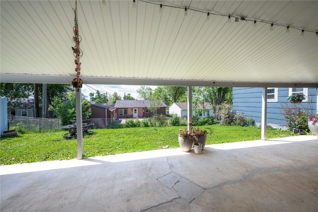 4721 Midway Dr NW, Cedar Rapids, IA 52405 - view of patio featuring a carport