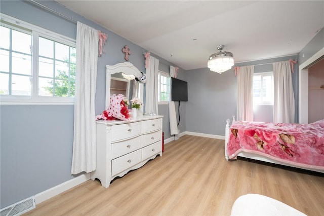 4721 Midway Dr NW, Cedar Rapids, IA 52405 - bedroom with light wood finished floors