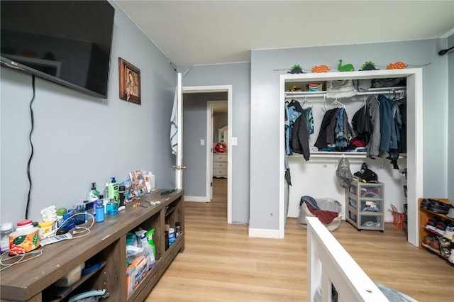 4721 Midway Dr NW, Cedar Rapids, IA 52405 - bedroom with a closet and light wood finished floors