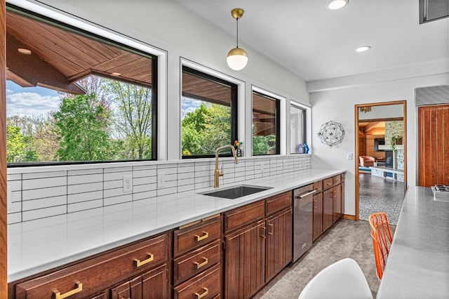 3715 170th St NE, Solon, IA 52333 - kitchen featuring healthy amount of natural light, stainless steel dishwasher, a sink, backsplash, and recessed lighting