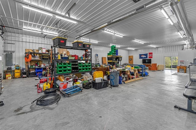 3715 170th St NE, Solon, IA 52333 - garage featuring electric panel and a workshop area