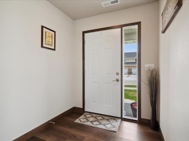 902 Creekside Dr, Tiffin, IA 52340 - foyer entrance featuring baseboards and dark wood finished floors