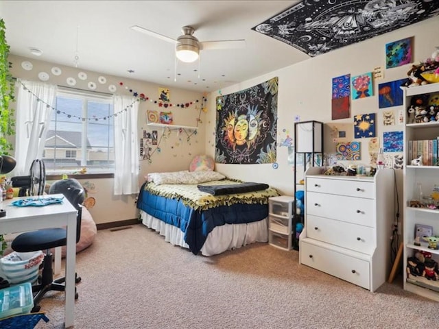 902 Creekside Dr, Tiffin, IA 52340 - bedroom featuring light carpet and ceiling fan