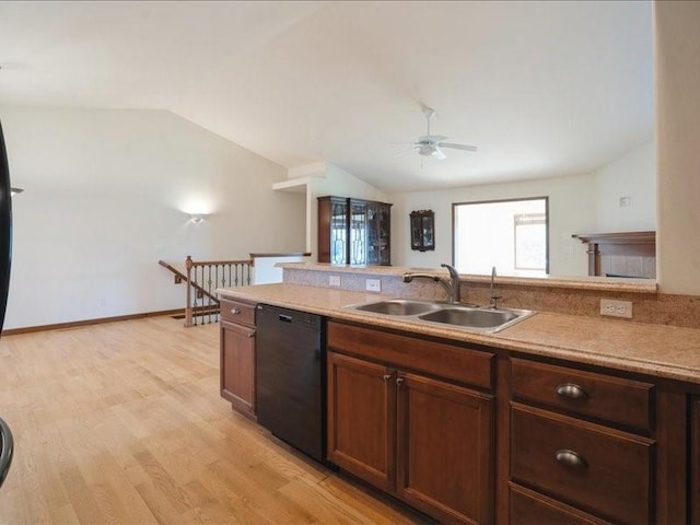 3314 35th Ave, Marion, IA 52302 - kitchen featuring dishwasher, a sink, vaulted ceiling, a ceiling fan, and light countertops