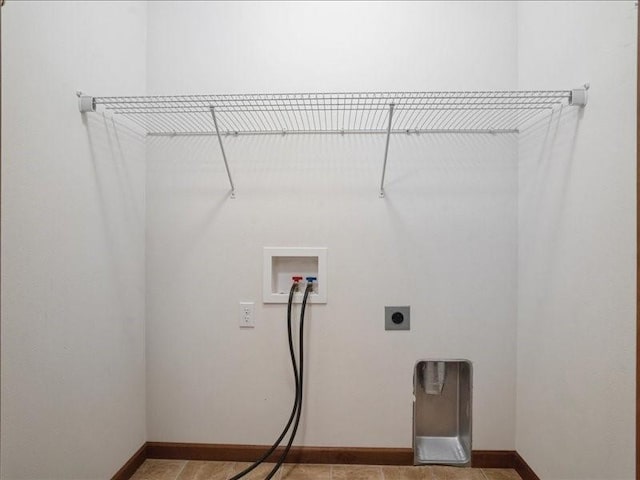 3314 35th Ave, Marion, IA 52302 - laundry area with hookup for an electric dryer, washer hookup, and baseboards