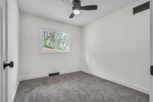 1418 26th St NW, Cedar Rapids, IA 52405 - carpeted spare room featuring baseboards and ceiling fan