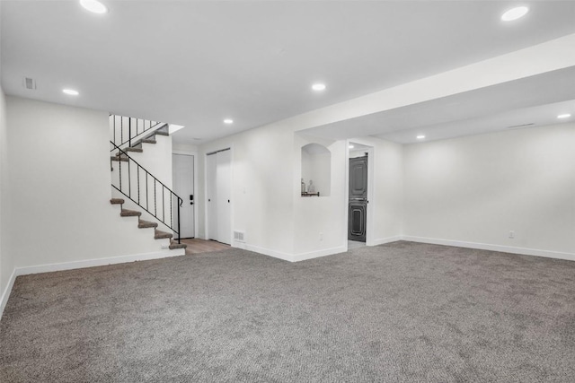 1418 26th St NW, Cedar Rapids, IA 52405 - below grade area featuring carpet, recessed lighting, baseboards, and stairway