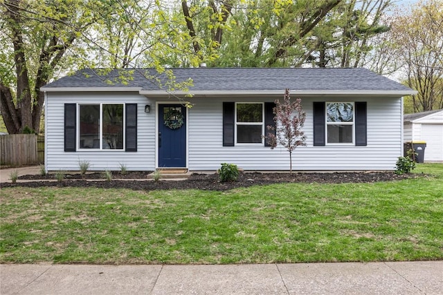 2227 California Ave, Iowa City, IA 52240 - ranch-style house with entry steps, a shingled roof, and a garage