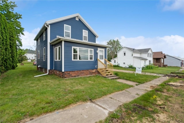 306 7th Ave, Clarence, IA 52216 - view of front of property featuring a front yard