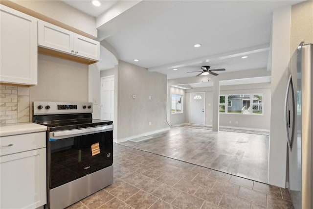 306 7th Ave, Clarence, IA 52216 - kitchen featuring stainless steel appliances, plenty of natural light, white cabinets, ceiling fan, and recessed lighting