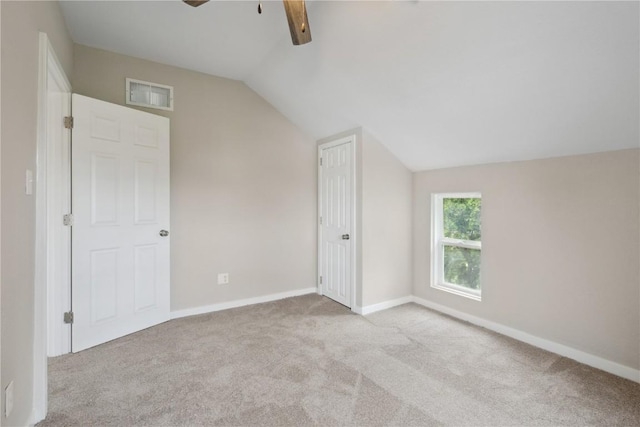 306 7th Ave, Clarence, IA 52216 - additional living space with ceiling fan, lofted ceiling, carpet, and baseboards