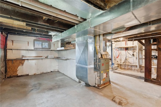 306 7th Ave, Clarence, IA 52216 - unfinished basement featuring heating unit