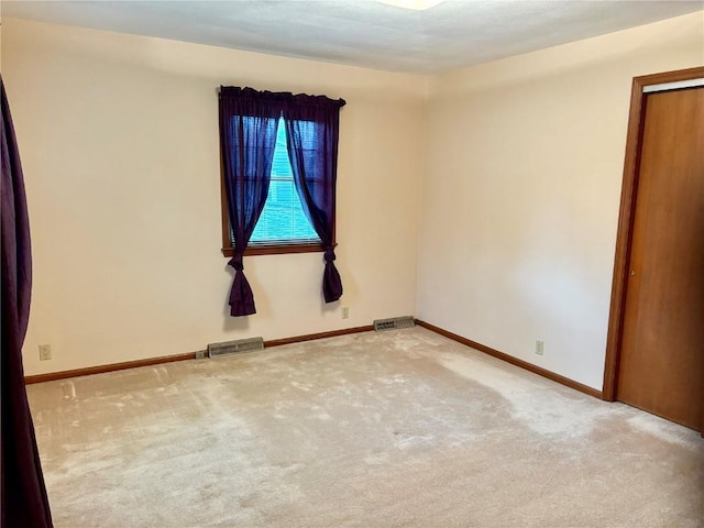 832 17th St SE, Cedar Rapids, IA 52403 - carpeted spare room with baseboards