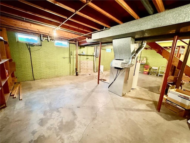 832 17th St SE, Cedar Rapids, IA 52403 - below grade area with brick wall and heating unit